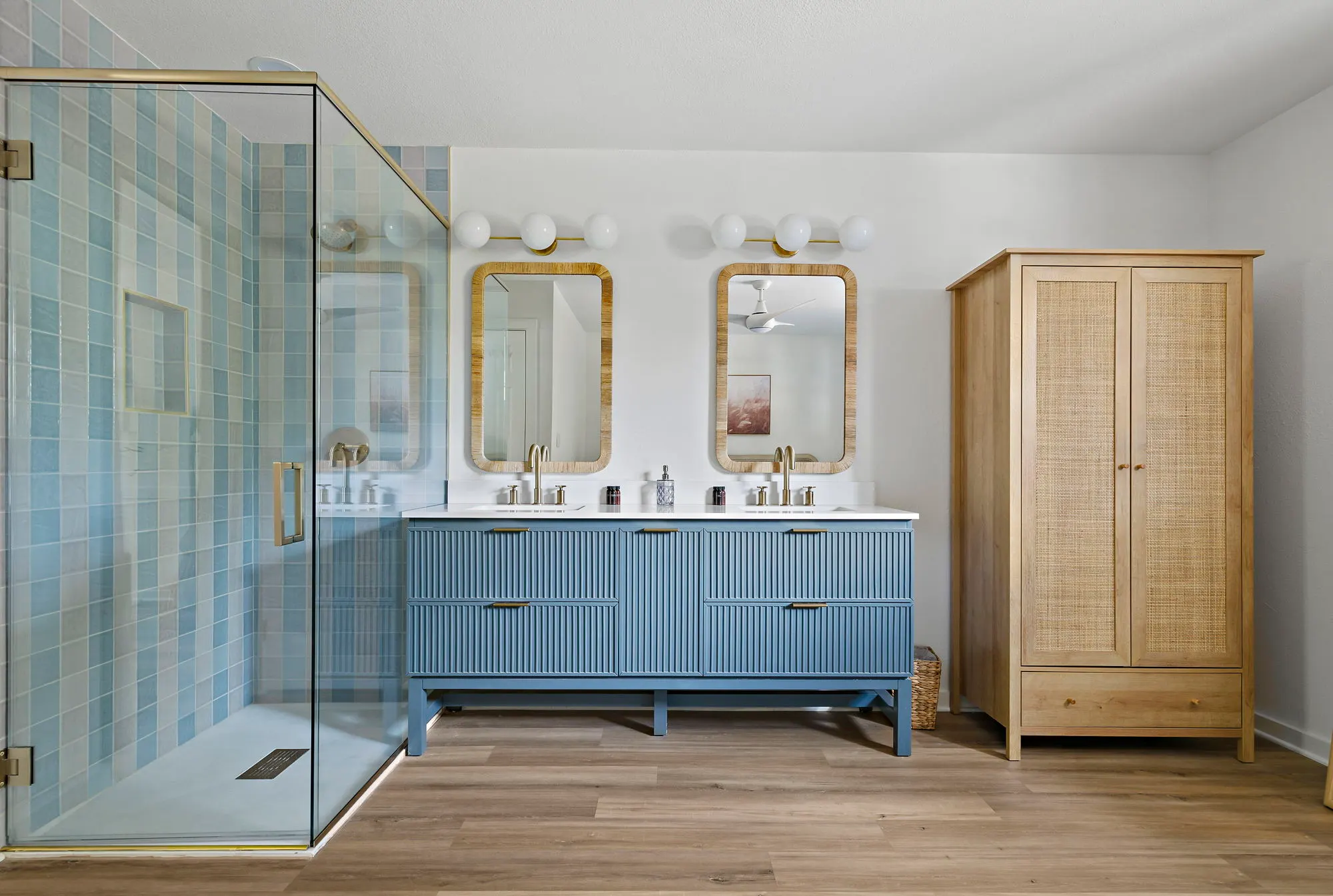 Bath with blue tile shower, fluted blue vanity and cane wardrobe, The Claire Hotel